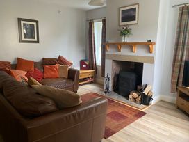 A living room with a sofa and fireplace at Gowanlea in Bellingham