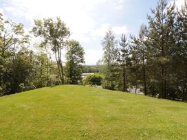 A view of a grassy area and trees at Ryedale Country Lodges - Hazel Lodge Kirkbymoorside