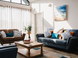 A living room with sofas and a coffee table at Betony in Bamburgh