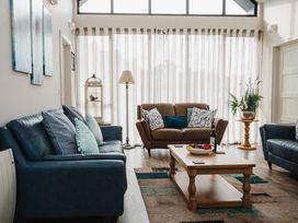 A living room with sofas and a coffee table at Betony in Bamburgh