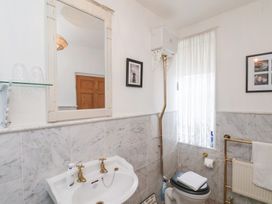 A bathroom with sink and toilet at 20A St Hilda's in Whitby