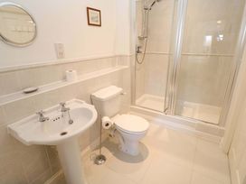 A bathroom with a shower and sink at Meridian in Carbis Bay
