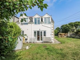 A house with a garden and outdoor seating at Kernyk in Rinsey near Porthleven