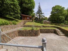 An outdoor area with a cabin and steps at Old Maids Cottage in Woolacombe