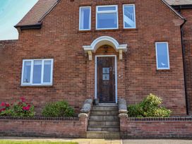A front entrance with steps and plants at 21 Eskdaleside Sleights