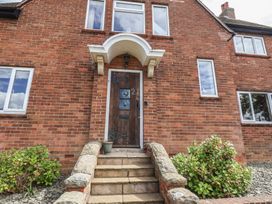 A front entrance with a door and windows at 21 Eskdaleside in Sleights