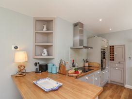 A kitchen with a countertop and appliances at 21 Eskdaleside Sleights