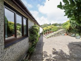 An outdoor area with a pathway and garden stairs at 8 Glan Ysgethin in Barmouth