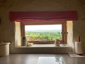 A kitchen with a view of the countryside at The Granary Mansergh near Kirkby Lonsdale