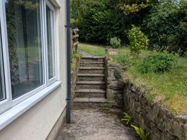 Steps leading to a garden area at Pool House The Narth near Trellech