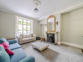 A living room with a sofa and coffee table at Milton Manor in Milton On Stour