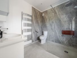 A bathroom with a sink and shower at Milton Manor in Milton On Stour