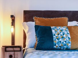 A bedroom with pillows on a bed at The Boars Head Pub in Bishop's Castle