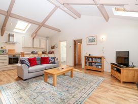 A living room with a sofa and coffee table at Tregona Buckland Monachorum near Yelverton