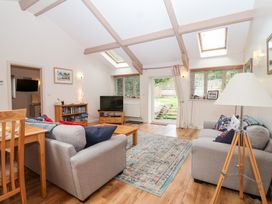A living room with a sofa and coffee table at Tregona Buckland Monachorum near Yelverton