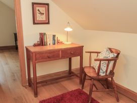 A study area with a desk and a chair at Badger Cottage in Babcary near Lydford-On-Fosse