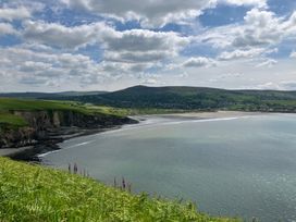 A coastal view with cliffs and sea at West End Cottage in Newport, Pembrokeshire