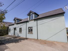 A house with multiple windows and a door at The Willows in Newport, Pembrokeshire