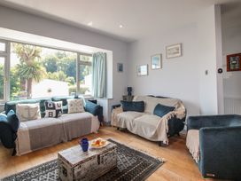 A living room with sofas and a coffee table at Anchor Cottage in Salcombe