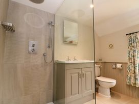 A bathroom with a shower and sink at Weavers Cottage in Carlton-in-Cleveland near Stokesley
