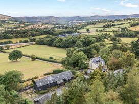 An outdoor view of fields and buildings at Hillside View in Rhayader