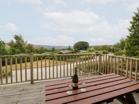A table with a champagne bottle and glasses at Mountain View in Rhayader