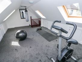 A gym with exercise equipment at Mountain Farm in Broad Haven