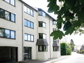 An exterior view of a building with windows and entrance at Lakeland Loft Windermere