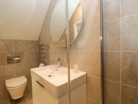A bathroom with a sink and toilet at Chapel How in Ambleside