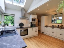 A kitchen with appliances and countertop at Underheron in Grasmere
