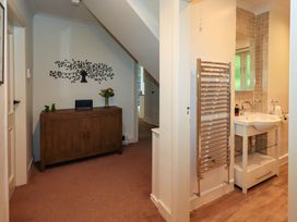 A bathroom with a sink and towel warmer at Underheron in Grasmere