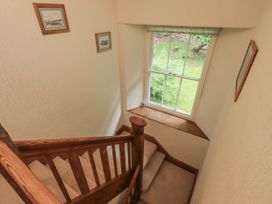 A stairway with a window at Miyanli in Bowness