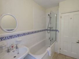 A bathroom with a bathtub and shower at Miyanli in Bowness