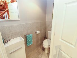 A bathroom with a sink and toilet at Cragfell Cottage Cartmel Fell