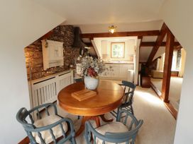 A dining room with a table and chairs at High Raise in Grasmere