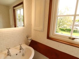 A bathroom with a sink and window at High Raise in Grasmere