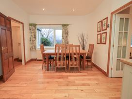 A dining room with a table and chairs at Fairfield Cottage in Grasmere