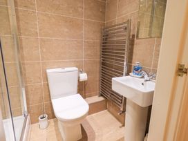 A bathroom with a toilet and sink at Fairfield Cottage in Grasmere