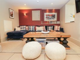 A snug with a sofa and coffee table at Archie's in Ambleside
