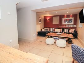 A living room with a sofa and coffee table at Archie's in Ambleside