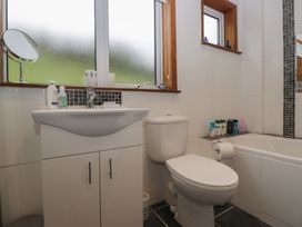A bathroom with a sink and toilet at Redwood in Ambleside