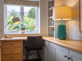 A home office with a desk and chair at Goody Raise in Grasmere
