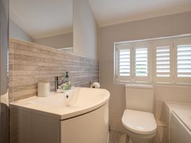 A bathroom with a sink and toilet at Goody Raise in Grasmere