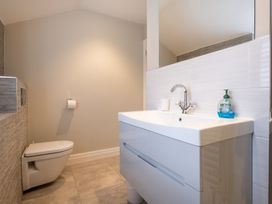 A bathroom with a sink and toilet at Goody Raise in Grasmere