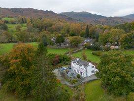 A house with garden and trees at Goody Raise in Grasmere
