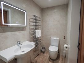 A bathroom with sink and toilet at Chapel Hill Cottage Ambleside