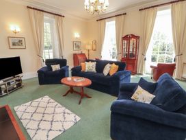 A living room with sofas and a coffee table at South View in Keswick
