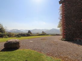 An outdoor area with a rock and view of mountains at South View in Keswick