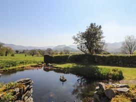 A view of mountains and a pond in an outdoor area at South View in Keswick