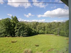 A view of hills and greenery at Elterwater Lodge in Elterwater